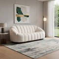 85" Cream Upholstered Curved Sofa